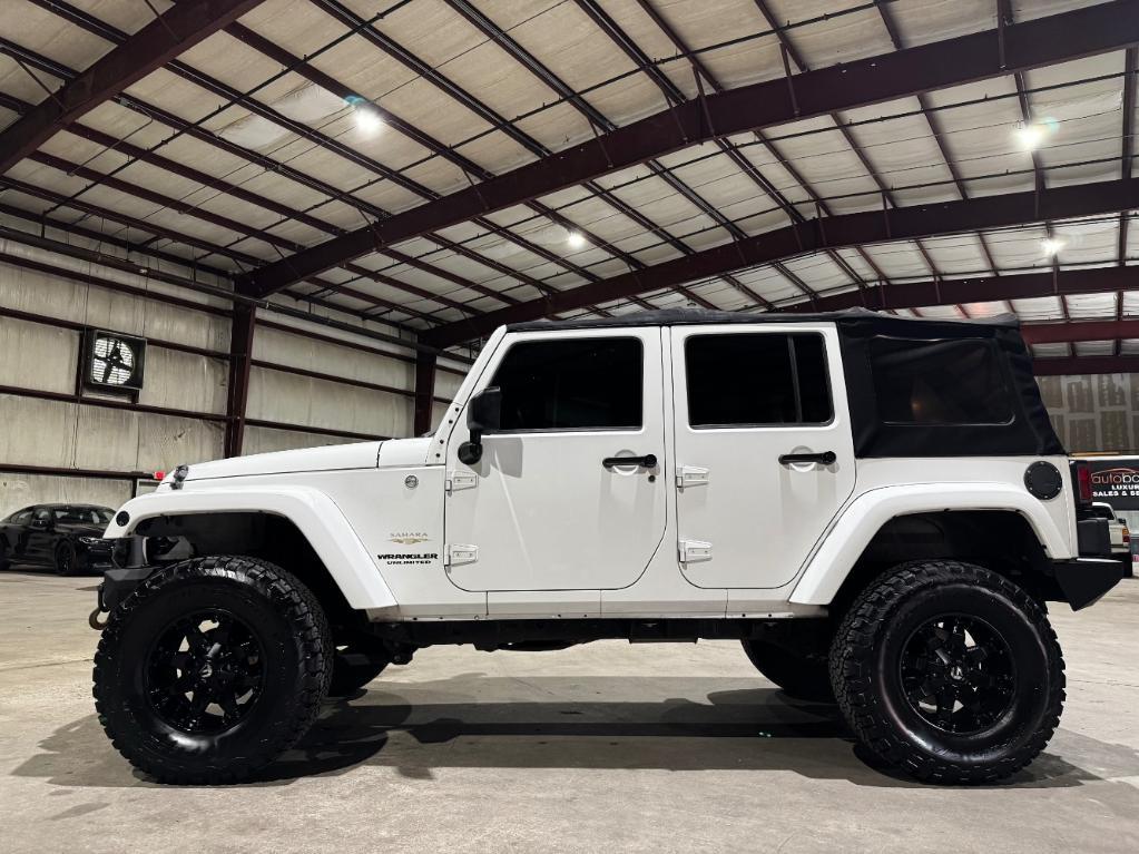 used 2012 Jeep Wrangler Unlimited car, priced at $14,499