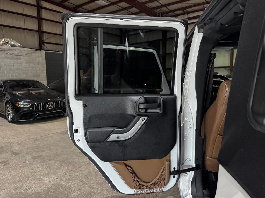 used 2012 Jeep Wrangler Unlimited car, priced at $14,499