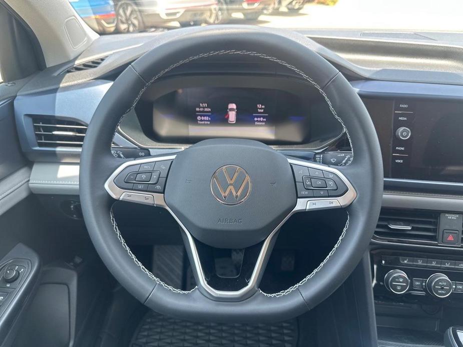 new 2024 Volkswagen Taos car, priced at $28,302