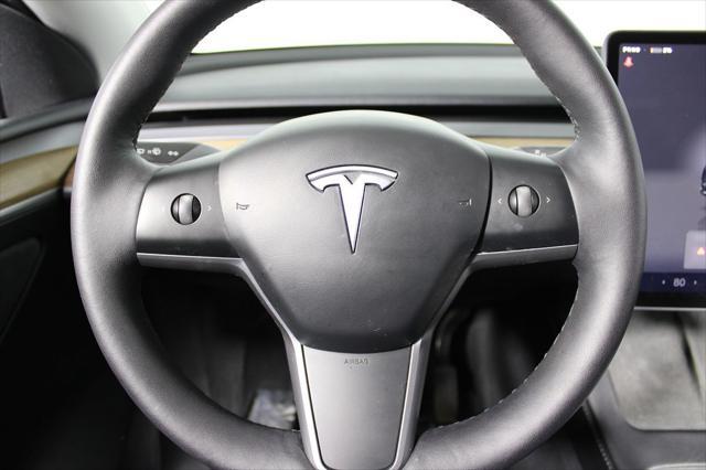 used 2023 Tesla Model Y car, priced at $28,144