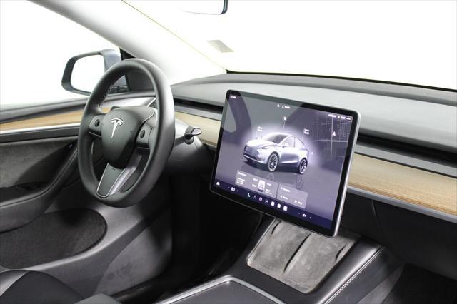 used 2023 Tesla Model Y car, priced at $28,144
