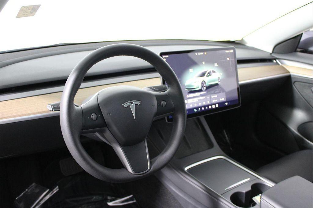 used 2023 Tesla Model 3 car, priced at $22,420