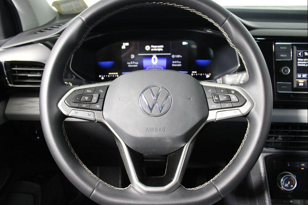 used 2023 Volkswagen Taos car, priced at $19,225