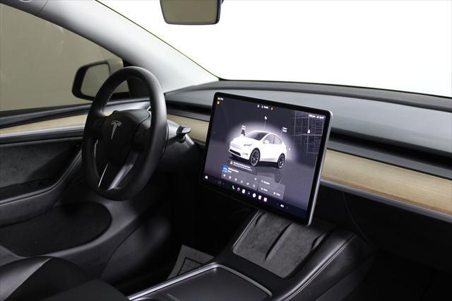 used 2024 Tesla Model Y car, priced at $34,520
