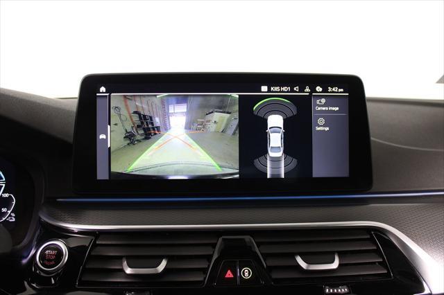 used 2023 BMW 530e car, priced at $31,336
