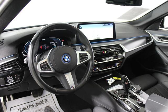 used 2023 BMW 530e car, priced at $31,336