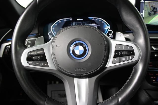 used 2023 BMW 530e car, priced at $31,336