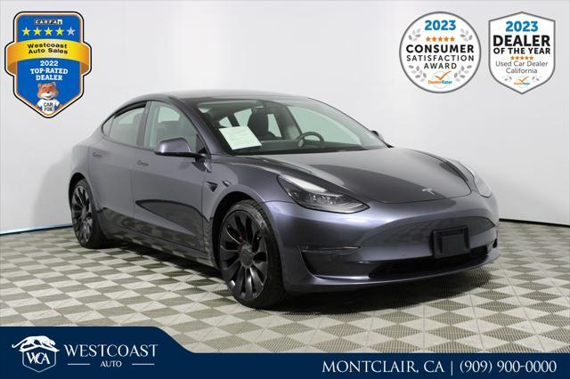 used 2022 Tesla Model 3 car, priced at $27,444