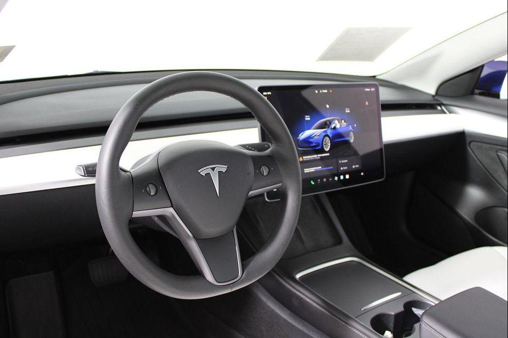 used 2023 Tesla Model 3 car, priced at $24,011