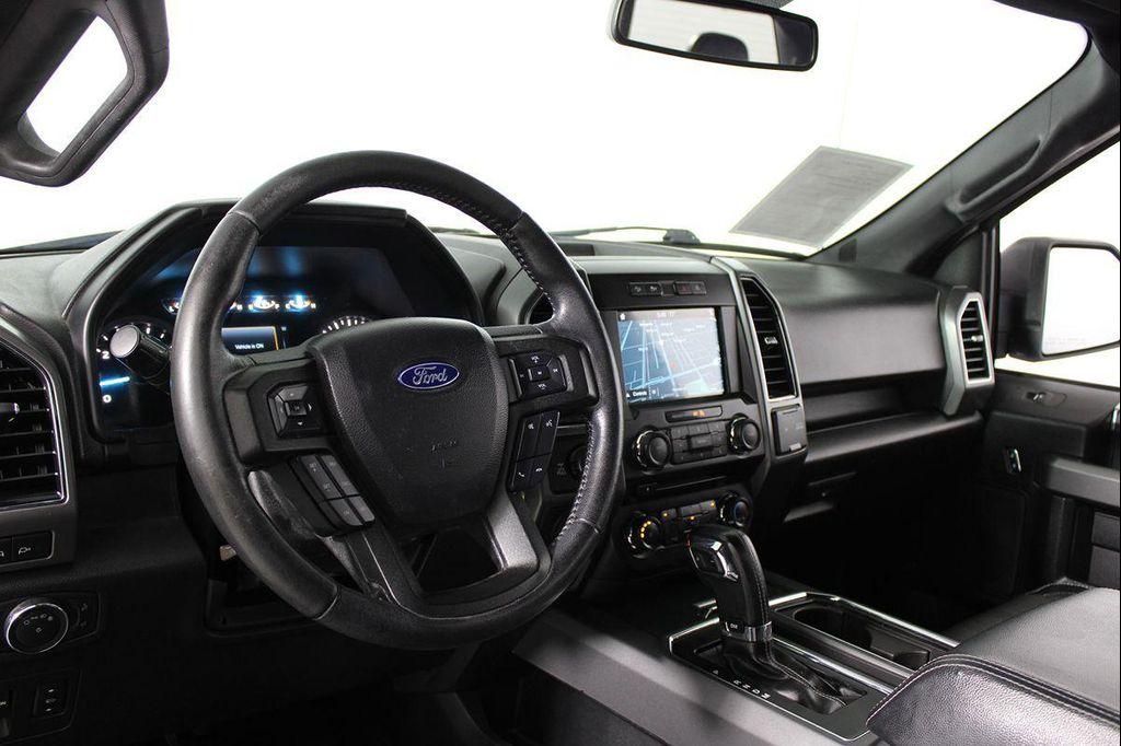 used 2018 Ford F-150 car, priced at $18,653
