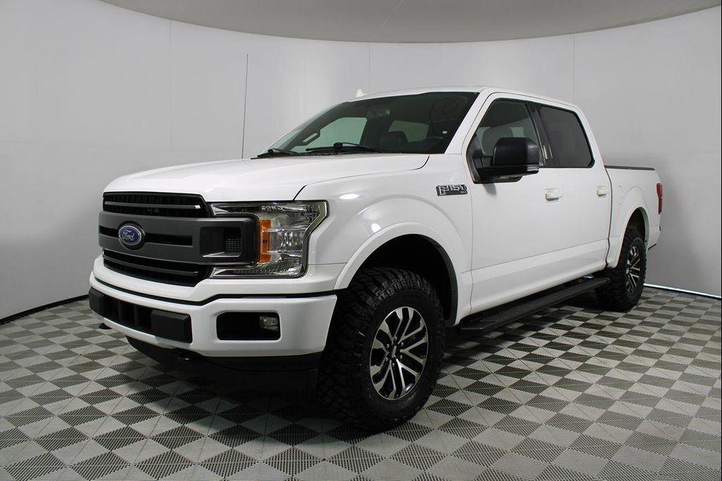 used 2018 Ford F-150 car, priced at $18,653