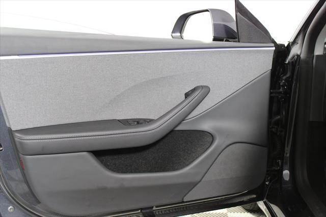 used 2025 Tesla Model 3 car, priced at $37,227