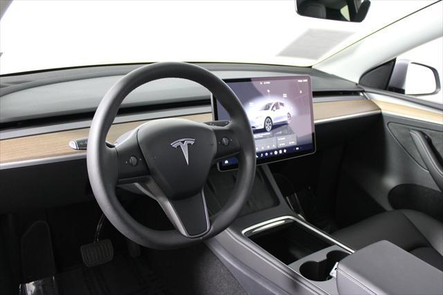 used 2025 Tesla Model Y car, priced at $39,602