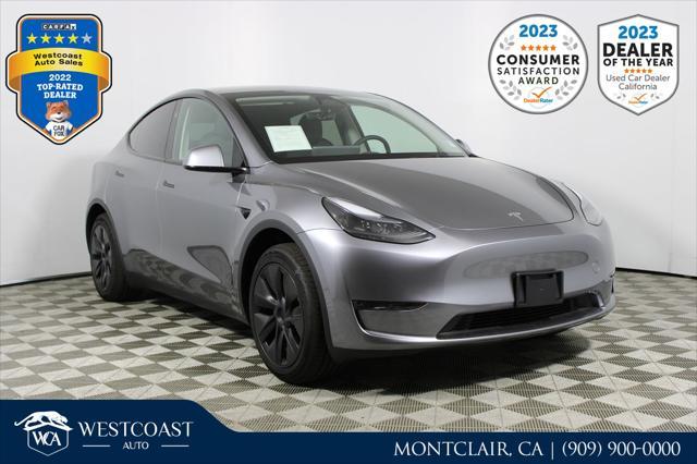 used 2025 Tesla Model Y car, priced at $41,489