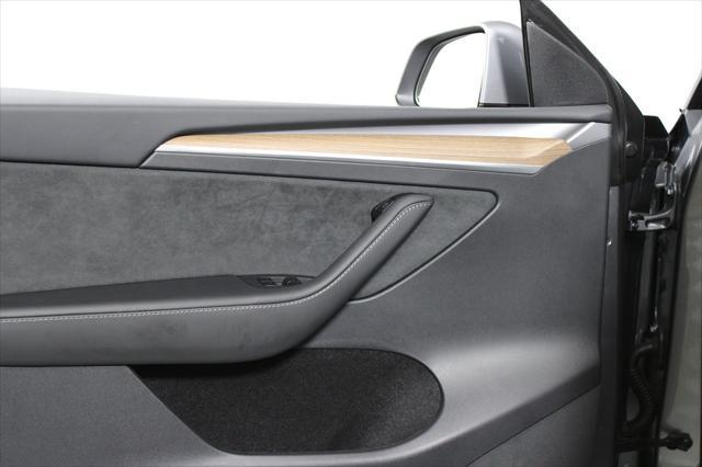 used 2025 Tesla Model Y car, priced at $39,602