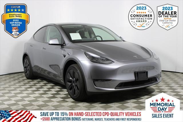 used 2025 Tesla Model Y car, priced at $39,427