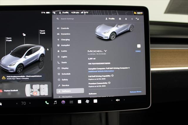 used 2025 Tesla Model Y car, priced at $39,602