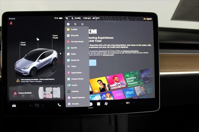 used 2025 Tesla Model Y car, priced at $39,602