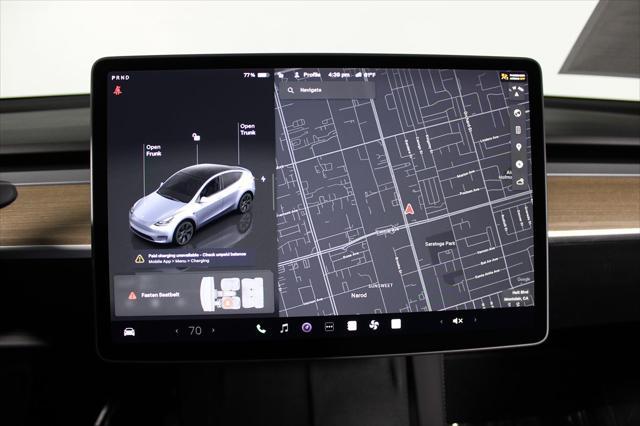 used 2025 Tesla Model Y car, priced at $39,602