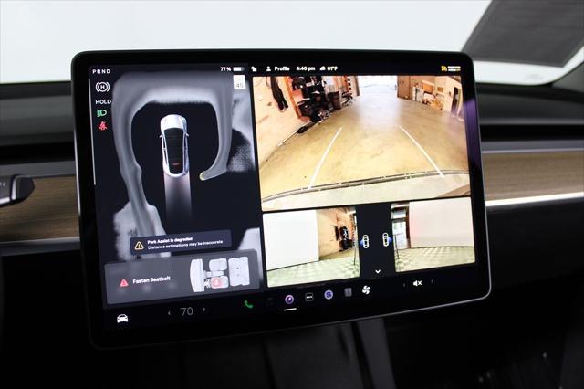 used 2025 Tesla Model Y car, priced at $39,602