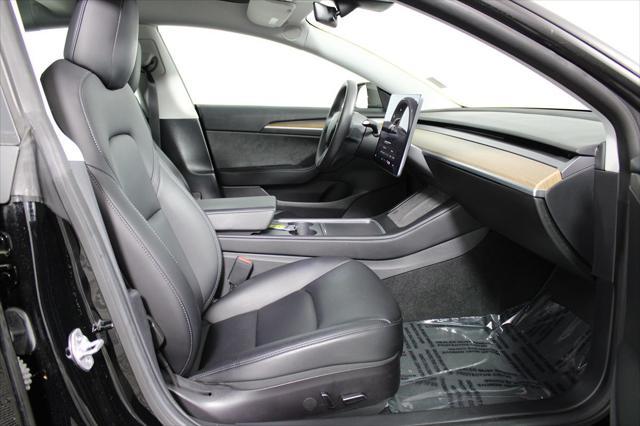 used 2022 Tesla Model 3 car, priced at $27,638