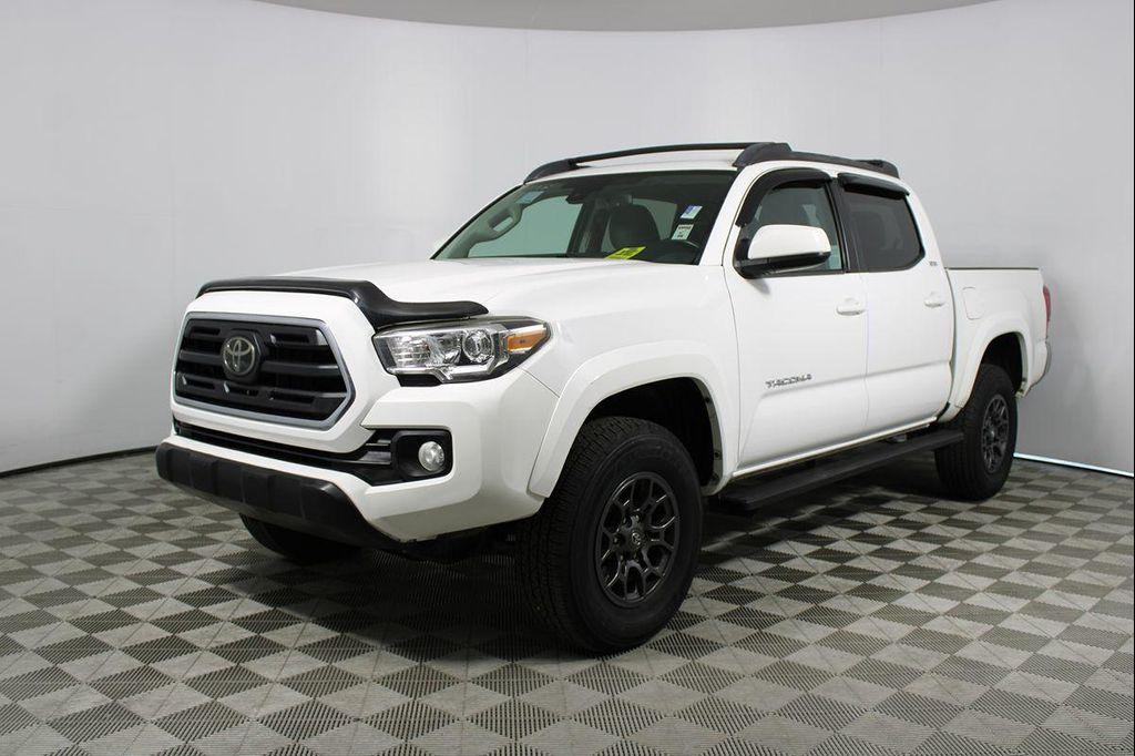 used 2018 Toyota Tacoma car, priced at $25,972