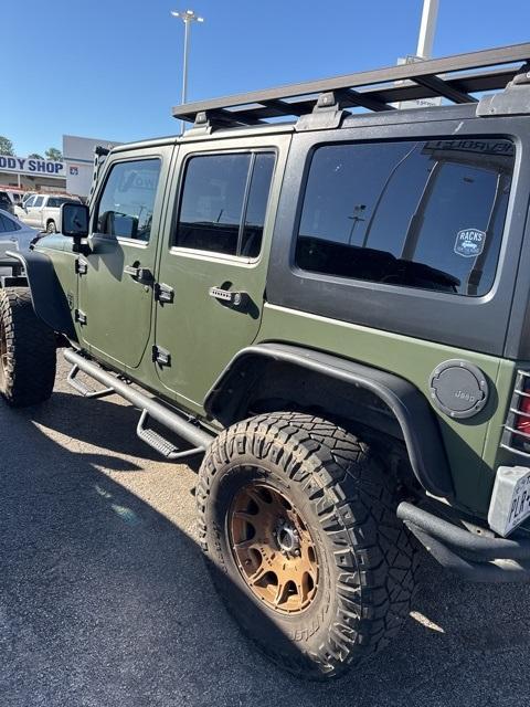 used 2013 Jeep Wrangler Unlimited car, priced at $16,991
