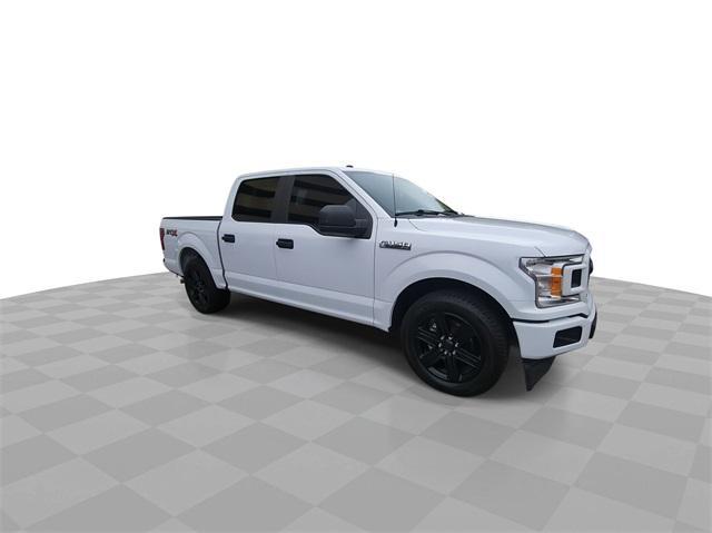 used 2018 Ford F-150 car, priced at $21,392