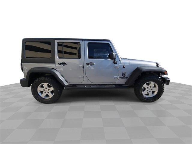 used 2013 Jeep Wrangler Unlimited car, priced at $15,992