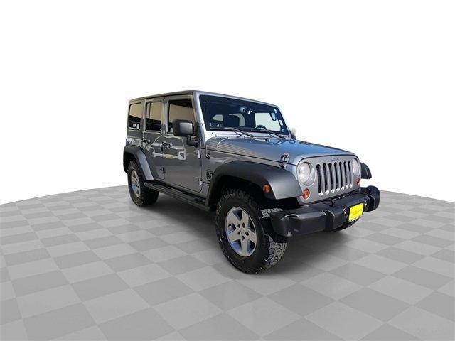 used 2013 Jeep Wrangler Unlimited car, priced at $15,992