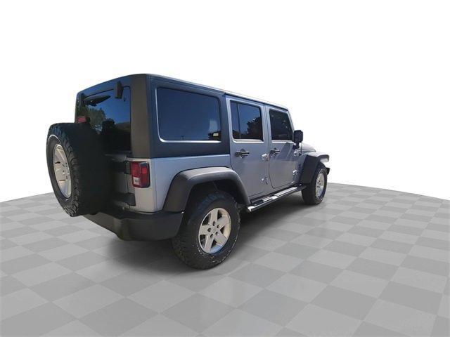 used 2013 Jeep Wrangler Unlimited car, priced at $15,992