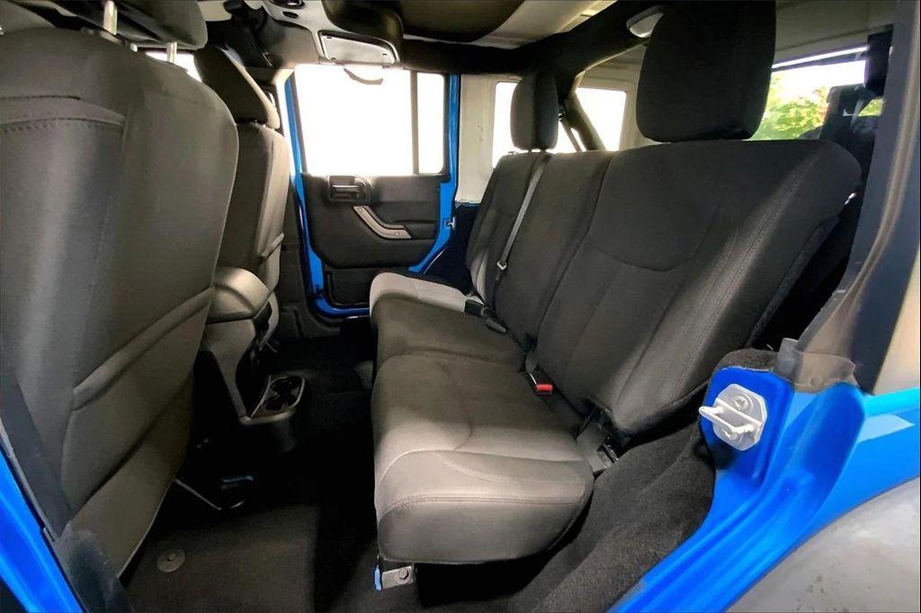 used 2015 Jeep Wrangler Unlimited car, priced at $18,997