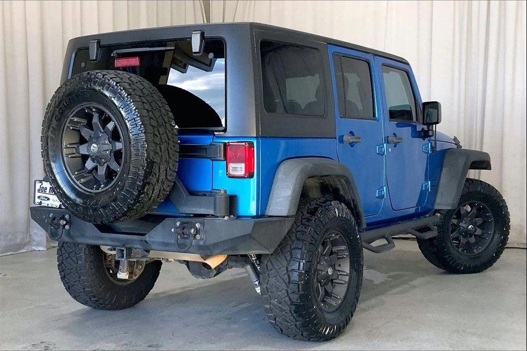 used 2015 Jeep Wrangler Unlimited car, priced at $18,997