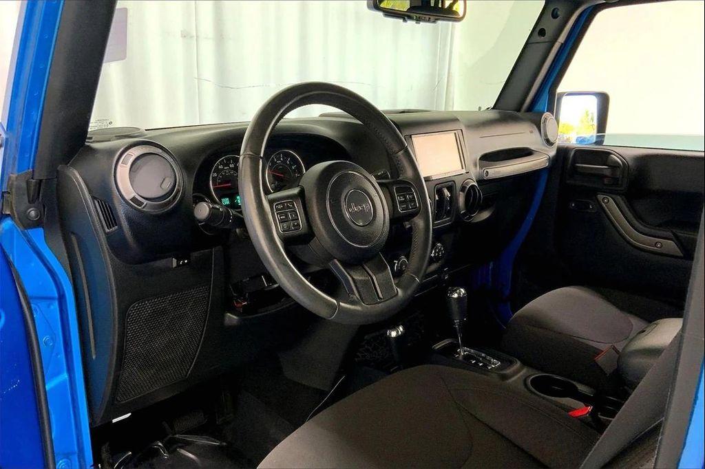 used 2015 Jeep Wrangler Unlimited car, priced at $18,997