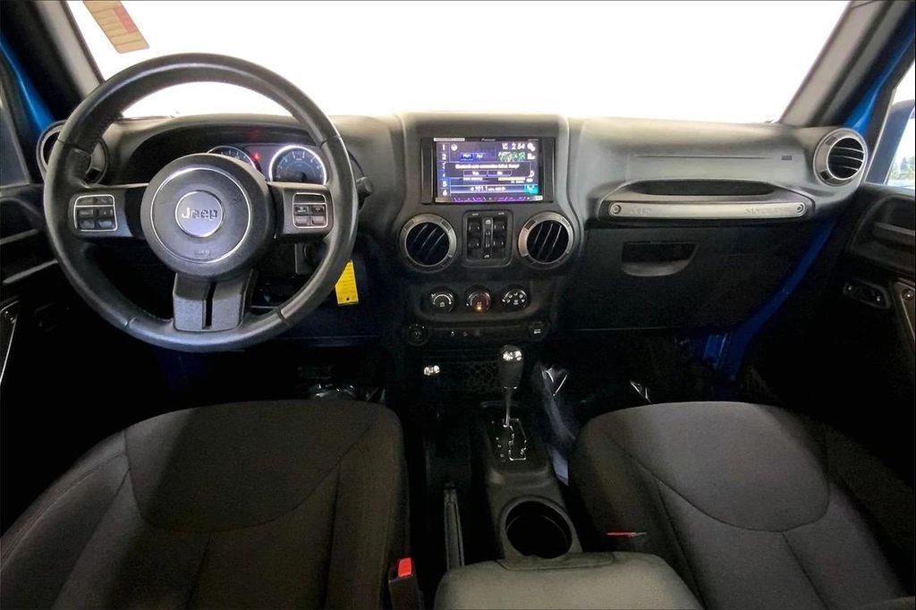 used 2015 Jeep Wrangler Unlimited car, priced at $18,997