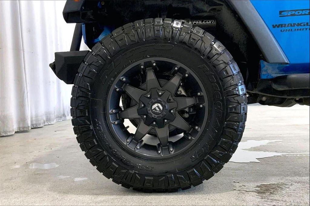 used 2015 Jeep Wrangler Unlimited car, priced at $18,997