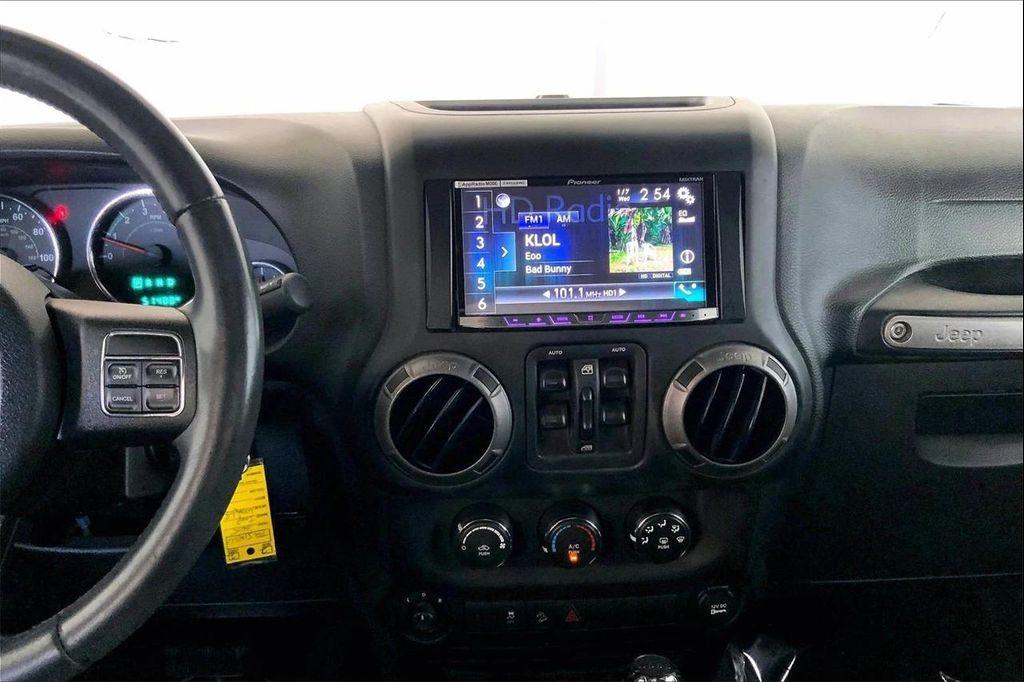 used 2015 Jeep Wrangler Unlimited car, priced at $18,997