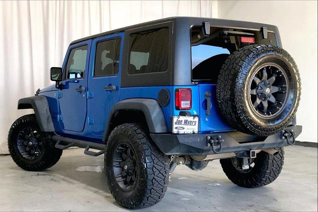 used 2015 Jeep Wrangler Unlimited car, priced at $18,997