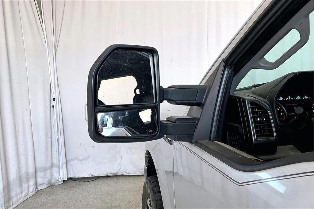 used 2018 Ford F-150 car, priced at $23,079