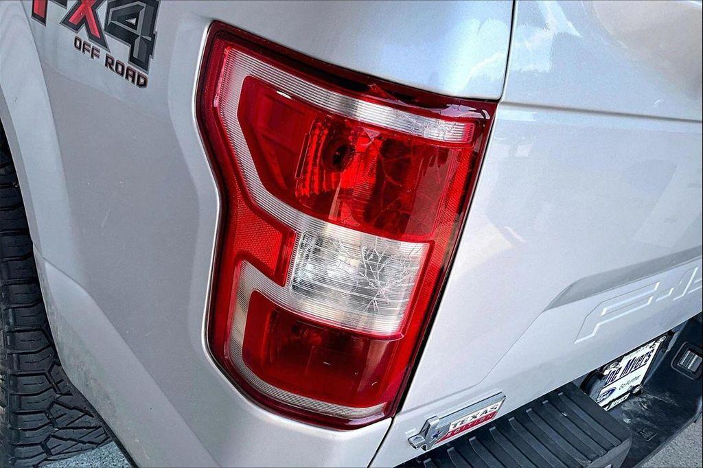 used 2018 Ford F-150 car, priced at $23,079