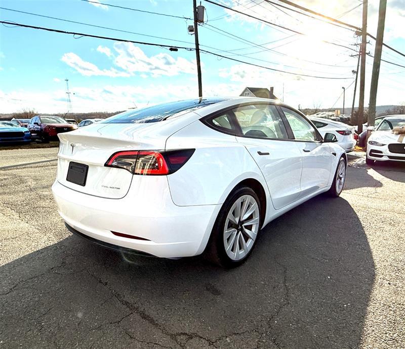 used 2023 Tesla Model 3 car, priced at $28,995