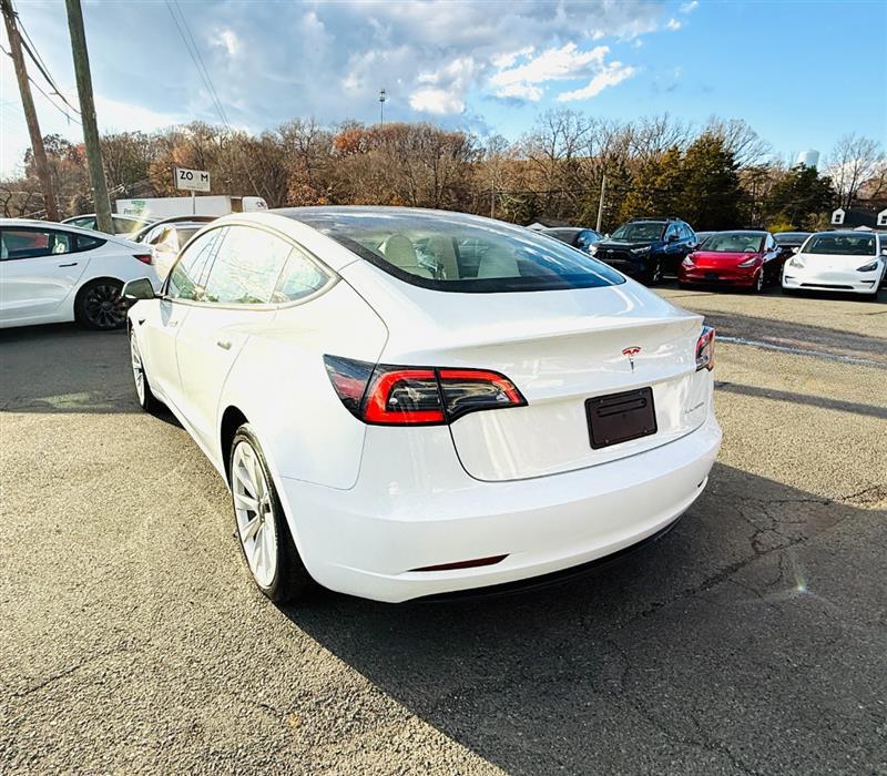 used 2023 Tesla Model 3 car, priced at $28,995