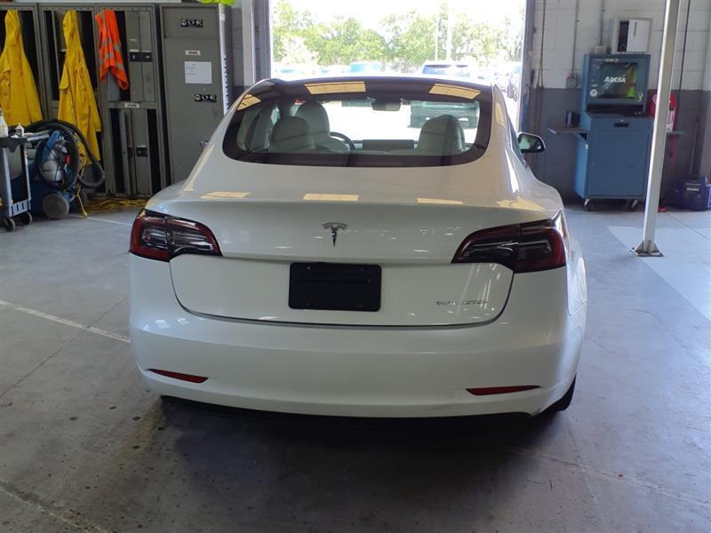 used 2023 Tesla Model 3 car, priced at $26,995