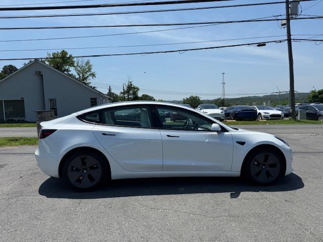 used 2022 Tesla Model 3 car, priced at $23,995