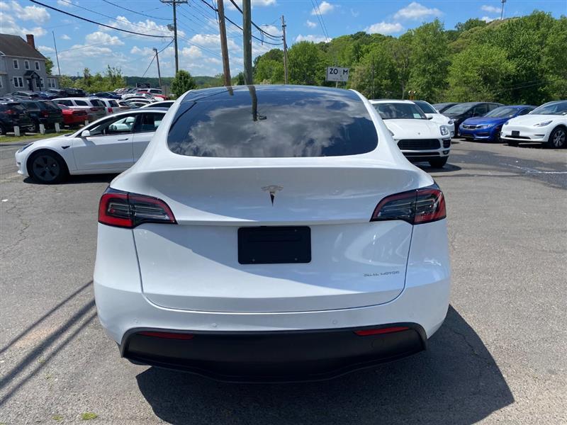 used 2021 Tesla Model Y car, priced at $28,995