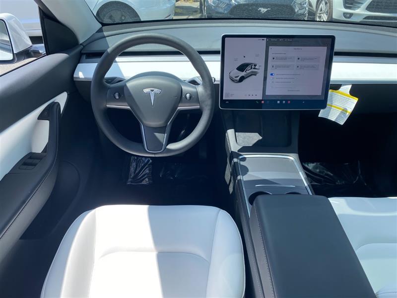 used 2021 Tesla Model Y car, priced at $28,995