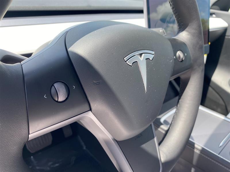 used 2021 Tesla Model Y car, priced at $28,995