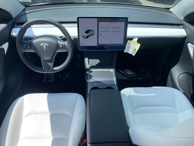 used 2021 Tesla Model Y car, priced at $28,995