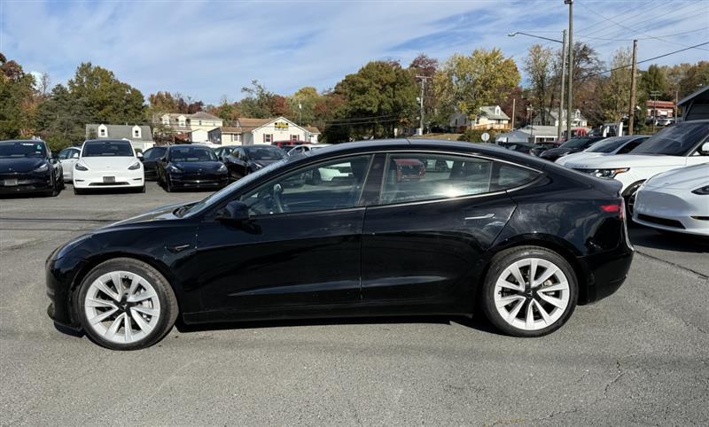 used 2023 Tesla Model 3 car, priced at $28,995