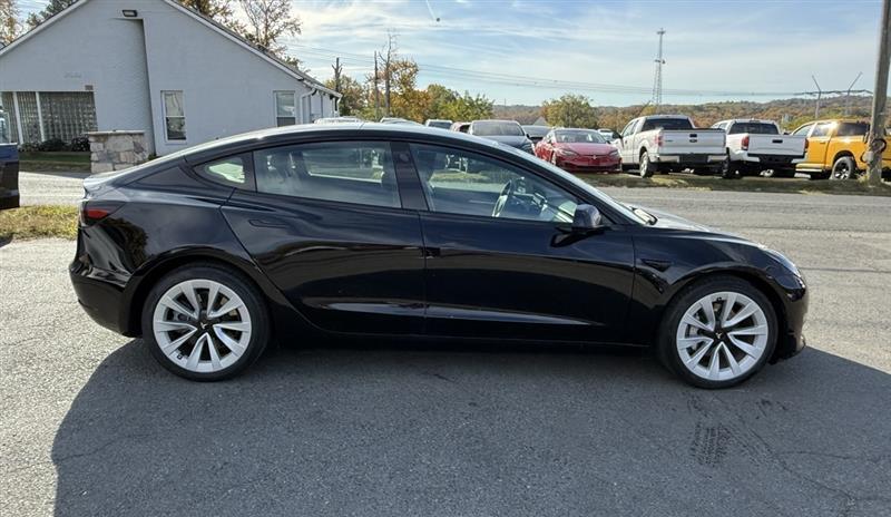 used 2023 Tesla Model 3 car, priced at $28,995